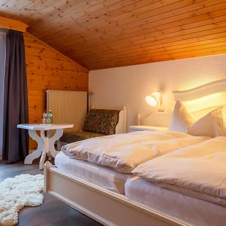 Отель The Larix Ski-in Ski-out