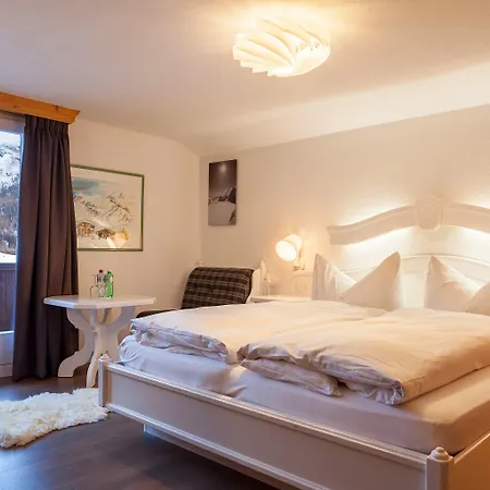 Отель The Larix Ski-in Ski-out